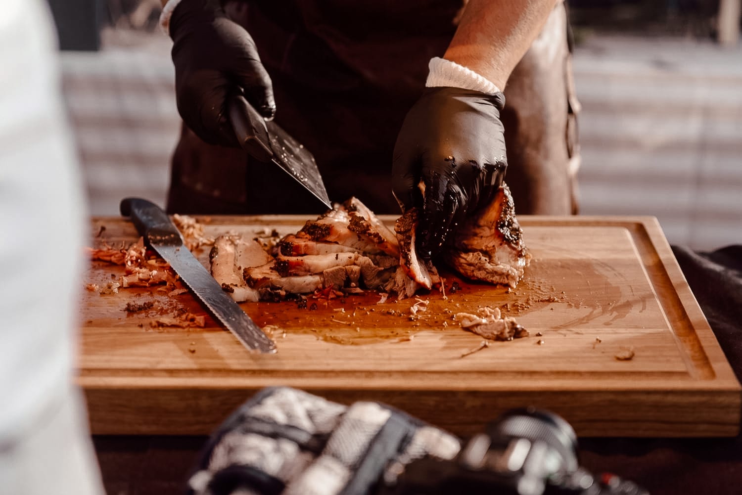 Chef portioning meat