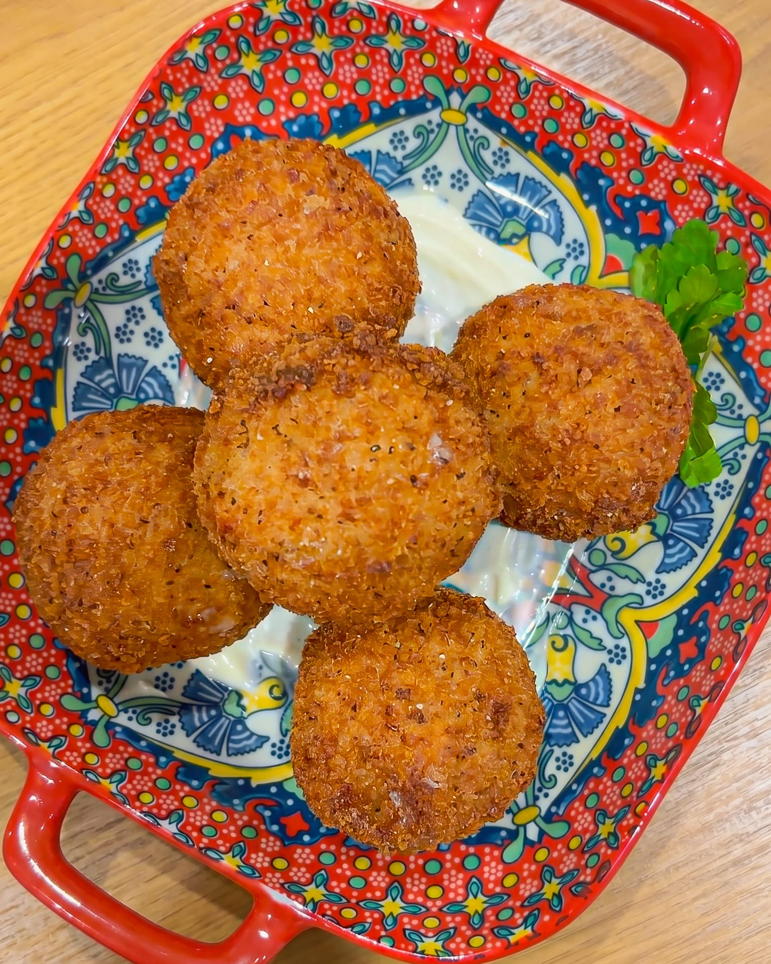 Golden arancini with aioli